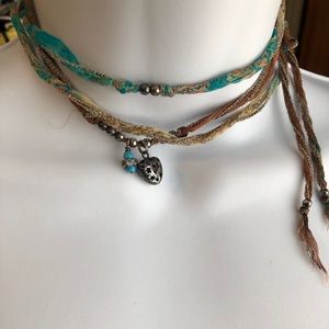 Johnny was necklace / Coker